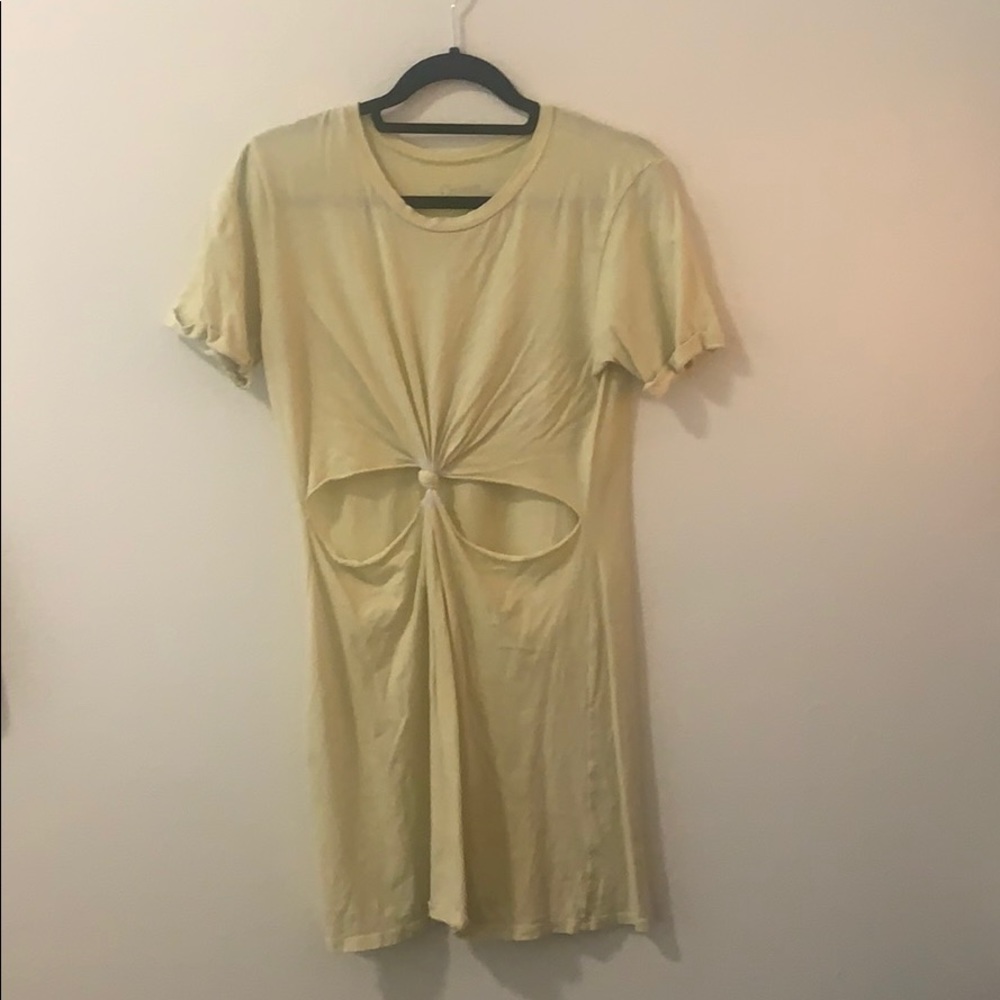 Yellow dress with cutouts in middle